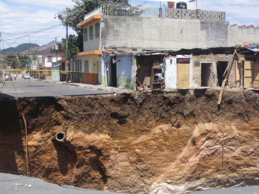 Huge sinkhole that occurred in 2007 in Guatemala City. Photo: Eric Haddox, CC BY 2.0 via Wikimedia Commons https://commons.wikimedia.org/wiki/File:Guatemala_city_sinkhole_2007_composite_view.jpg